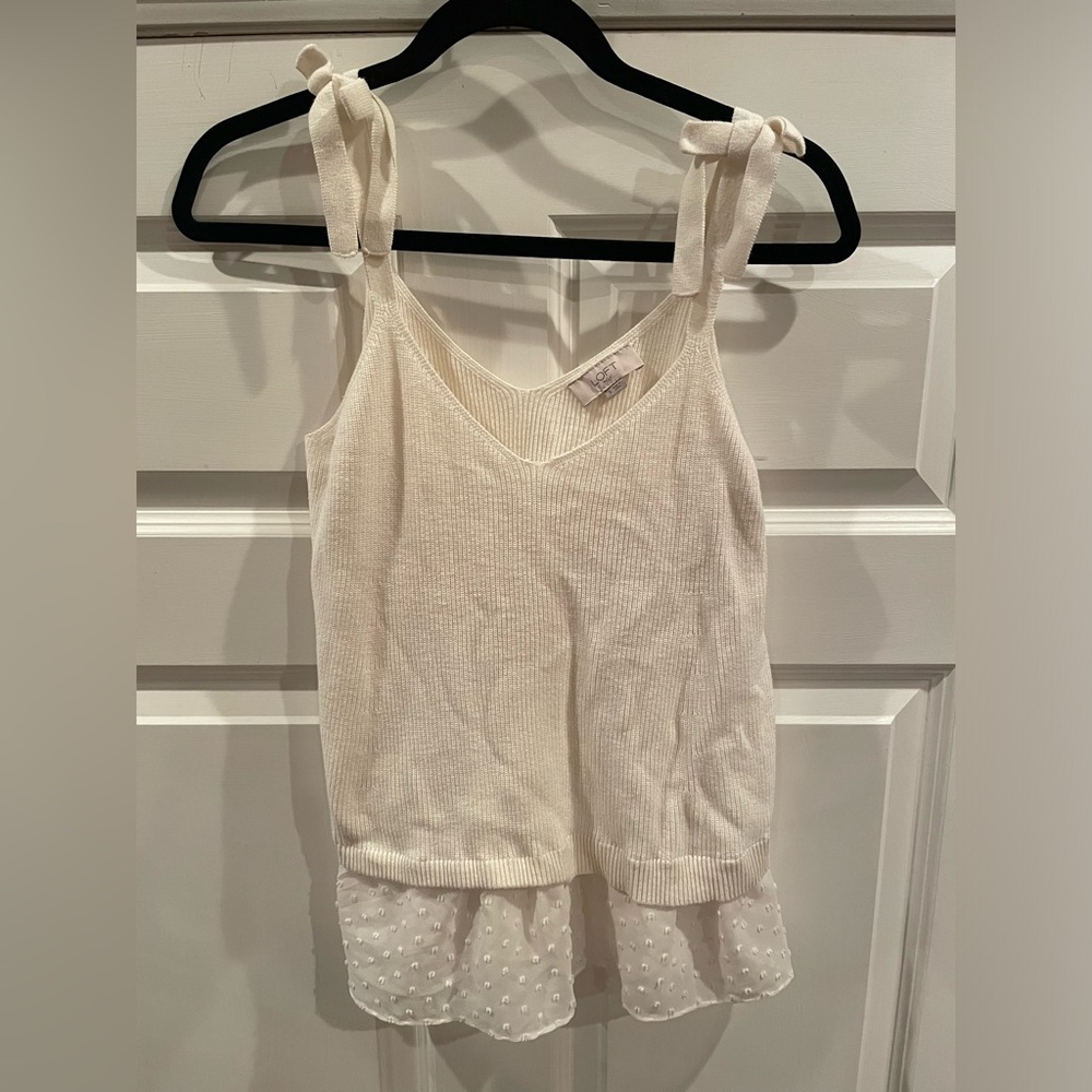 Loft size S tank with bow detail.